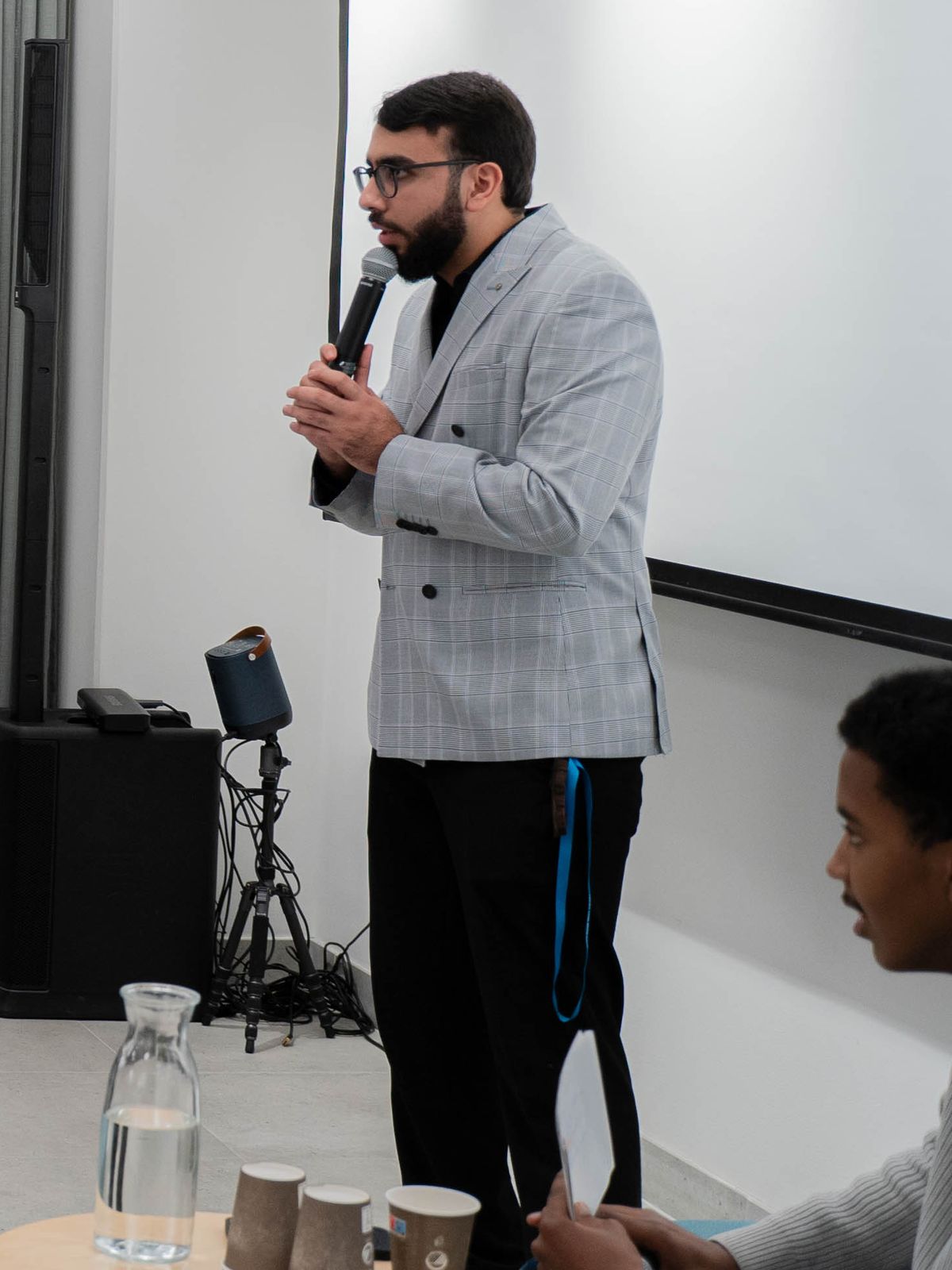Amin Al Qatanani talar på Unity: Gårdsten i december 2025.